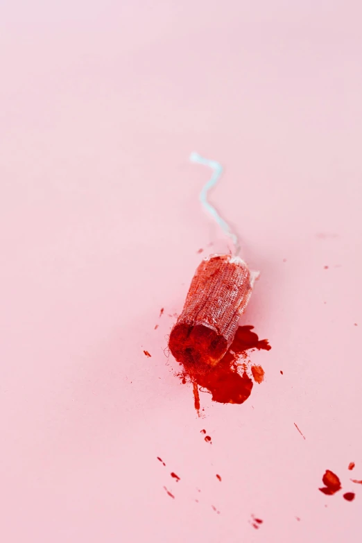 a bottle of red liquid with a straw sticking out of it, by Elsa Bleda, pexels contest winner, magic realism, covered in pink flesh, toothpaste blast, stab wound, pencil