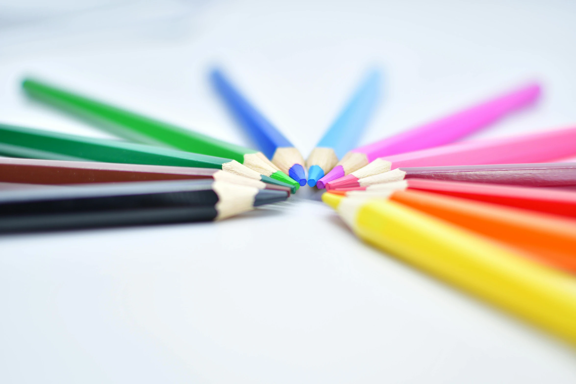 a group of colored pencils arranged in a circle, a child's drawing, pexels, on a white table, 15081959 21121991 01012000 4k, colourful!! highly detailed, black and white color