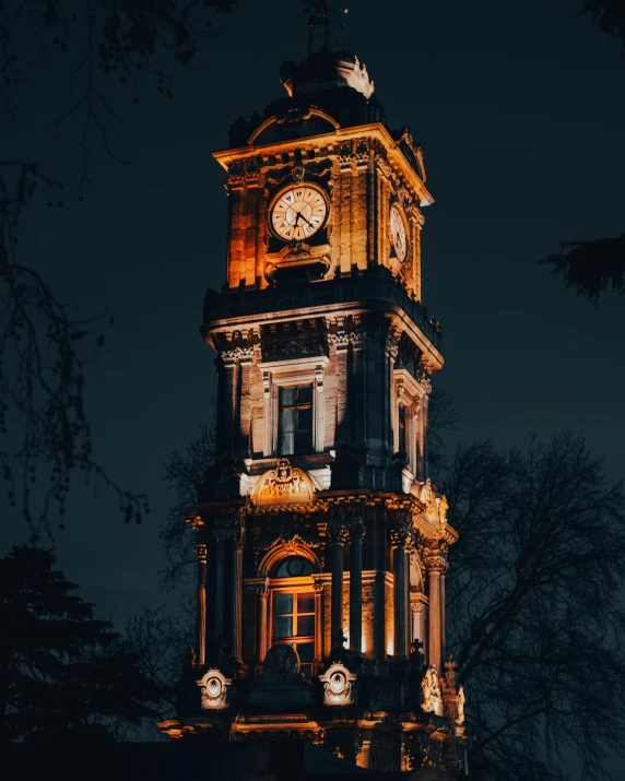 a tall clock tower lit up at night, pexels contest winner, baroque, 2022 photograph, gif, mystical kew gardens, istanbul