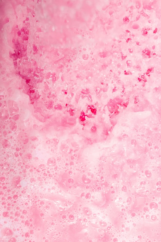 a close up of a pink substance in the water, an album cover, pexels, bubble bath, ((pink)), squashed berry stains, pattern