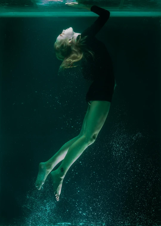 a woman floating in a body of water, inspired by Elsa Bleda, art photography, 8k archival print, kano), full frame image