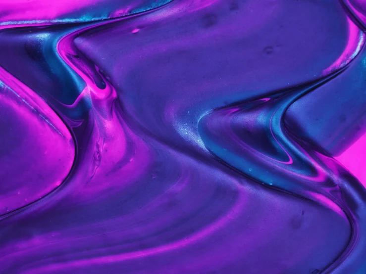 a close up of a purple and blue liquid, trending on pexels, abstract art, neon purple, metallic paint, pink and purple, currents