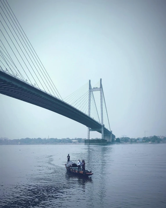 a boat in a body of water with a bridge in the background, pexels contest winner, bengal school of art, instagram post, grey, promo image, urban surroundings