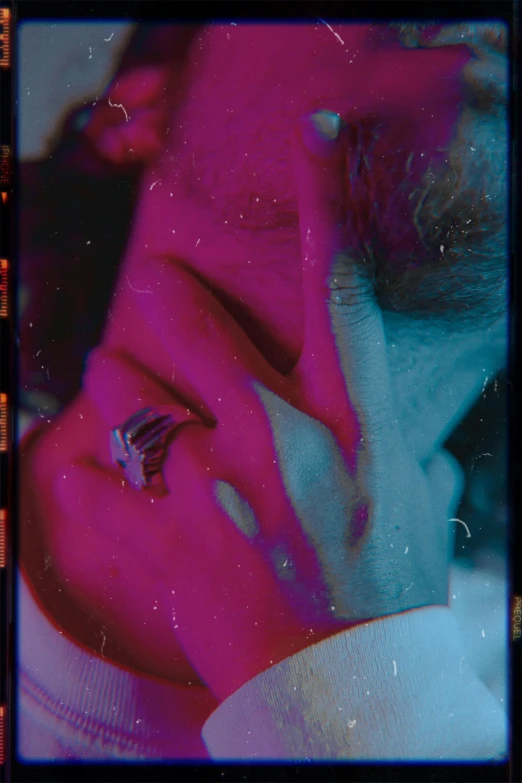a close up of a person talking on a cell phone, inspired by Elsa Bleda, video art, psychedelic and glittering, magenta and crimson and cyan, gaspar noe, photographed on damaged film
