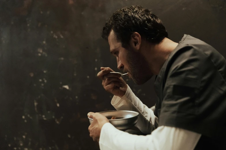 a man sitting on a toilet eating from a bowl, a portrait, inspired by Théodore Géricault, pexels contest winner, renaissance, henry cavill, in prison, high resolution film still, ned kelly