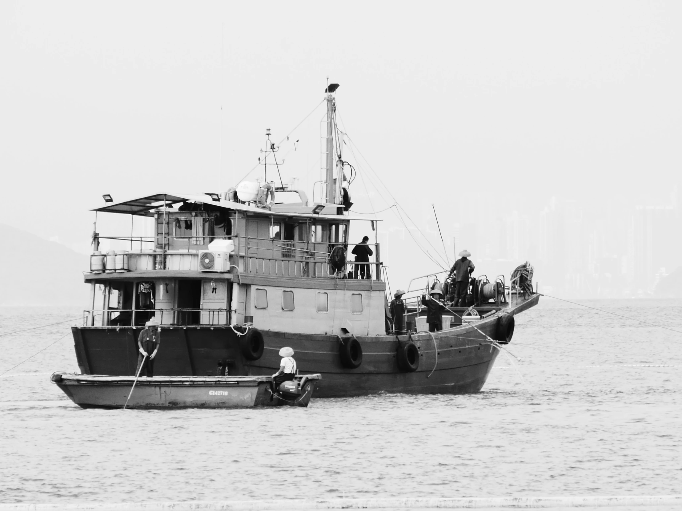 a black and white photo of a boat in the water, figuration libre, people at work, malaysian, photographic print, high detail photo