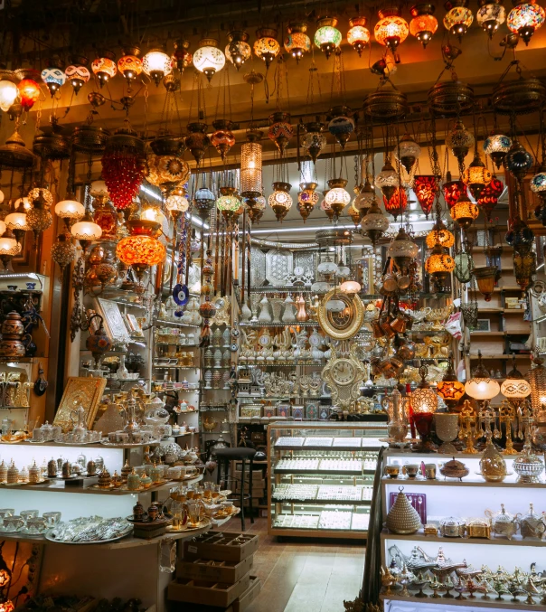 a store filled with lots of different types of lights, by Douglas Shuler, pexels, art nouveau, damascus, tan, square, crystal