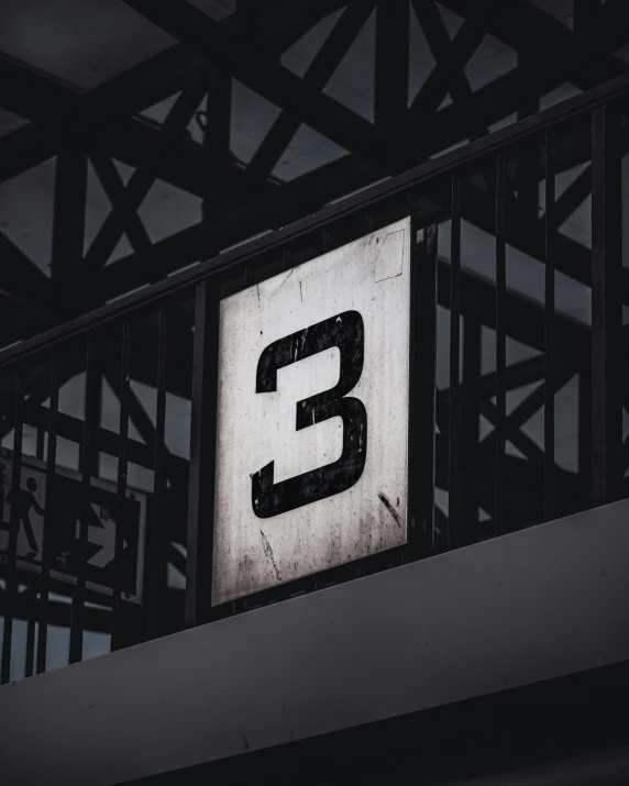 a close up of a sign on a building, rule of three, unsplash photo contest winner, in a gym, profile image