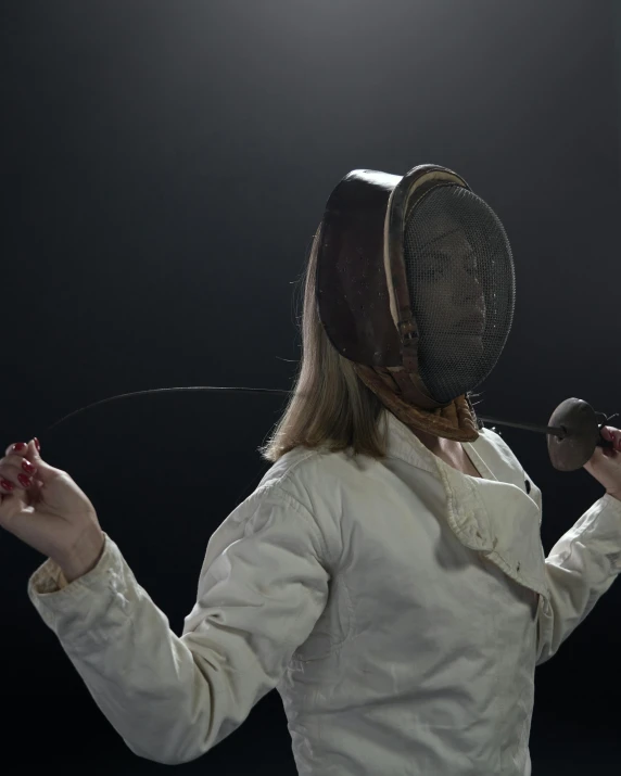 a woman in a fencing suit holding a microphone, unsplash, neo-figurative, hans bellmer and nadav kander, tournament, profile image