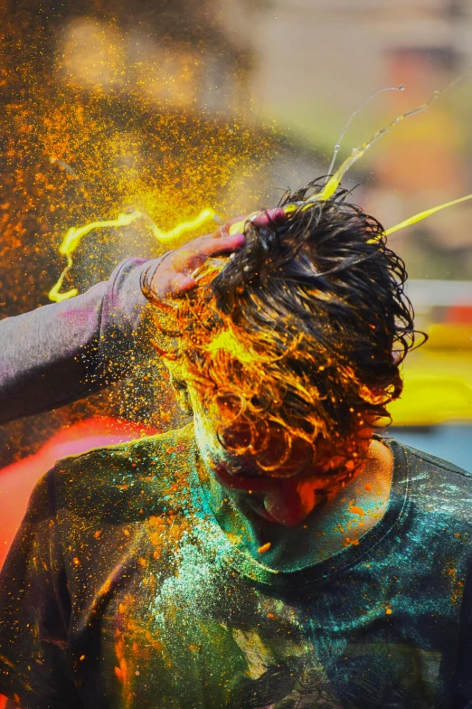 a man getting his hair sprayed with colored powder, a colorized photo, pexels contest winner, action painting, splattered goo, orange glowing hair, colorul, yellow spiky hair