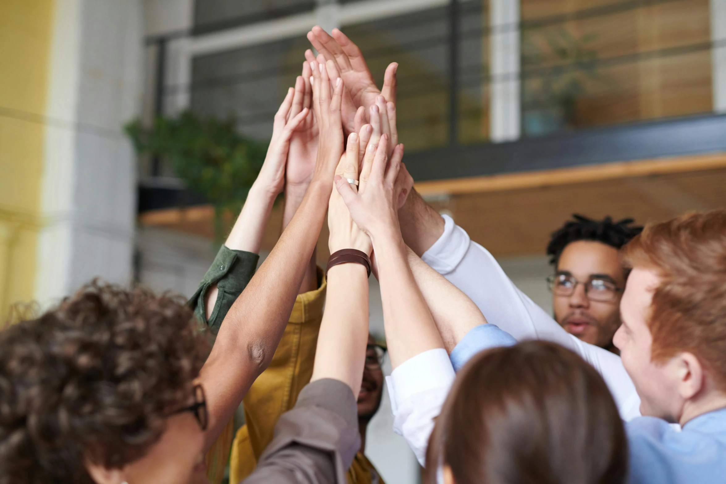 a group of people with their hands in the air, pyramid scheme, avatar image