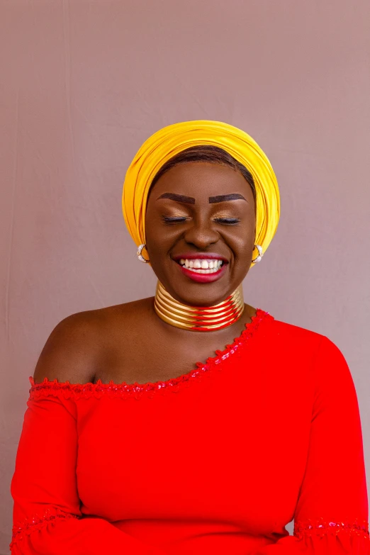 a woman in a red dress and a yellow turban, an album cover, inspired by Chinwe Chukwuogo-Roy, trending on pexels, gold choker, radiant smile. ultra wide shot, 15081959 21121991 01012000 4k, round-cropped