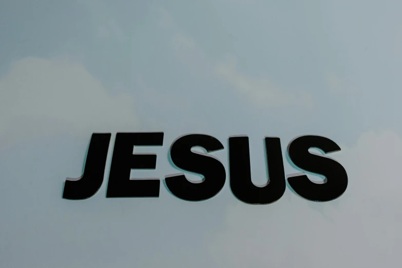 a sign that says jesus on the side of a building, unsplash, show from below, vehicle, 15081959 21121991 01012000 4k, extreme closeup