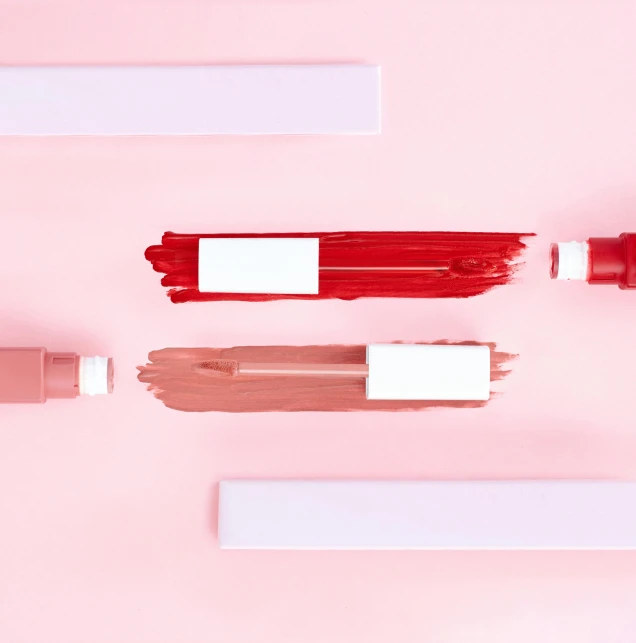 various shades of lipstick on a pink surface, inspired by Giorgio Morandi, trending on pexels, red and white, markers, two colors, product render