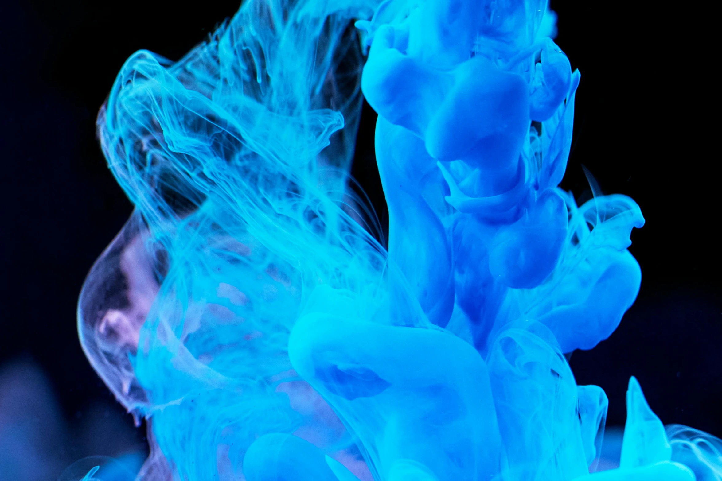 a close up of a blue substance in water, digital art, inspired by Kim Keever, pexels, neon ink, avatar image, dayglo blue, whirling smoke