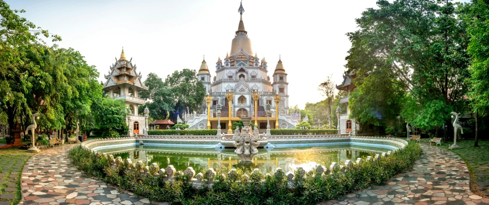 a small fountain in the middle of a park, pexels contest winner, art nouveau, vietnamese temple scene, avatar image, golden towers, high-resolution photo