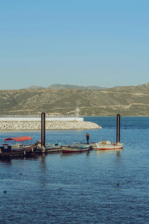 a couple of boats that are in the water, les nabis, small dock, with mountains in the distance, vallejo, today\'s featured photograph 4k