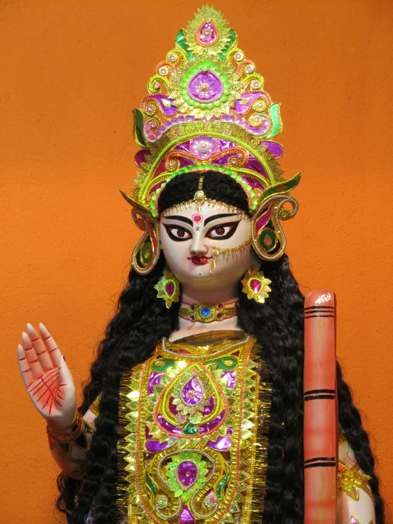 a close up of a statue of a woman, a statue, by Sunil Das, elaborately costumed, avatar image, arms extended, wearing authentic attire