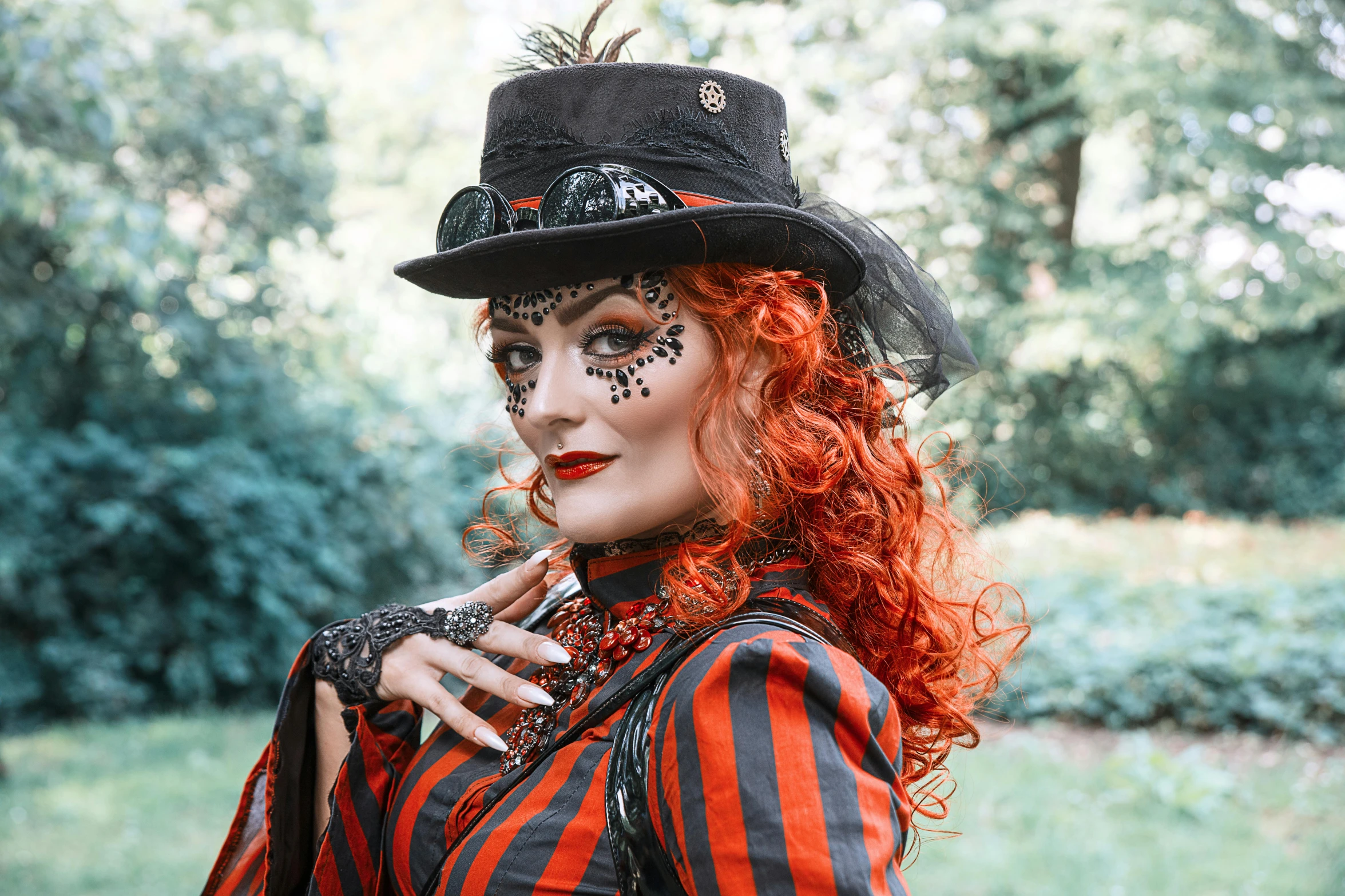 a woman with red hair wearing a top hat, inspired by Louis Grell, pexels, intricate clown costume, square, chitty chitty bang bang, black sclera