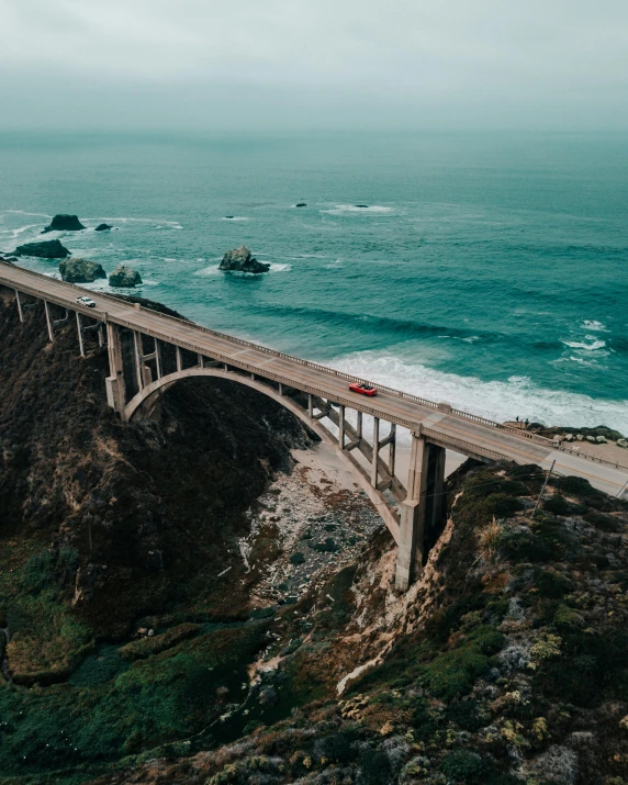 a bridge over a large body of water, pexels contest winner, california coast, 2 5 6 x 2 5 6 pixels, lgbtq, cars on the road