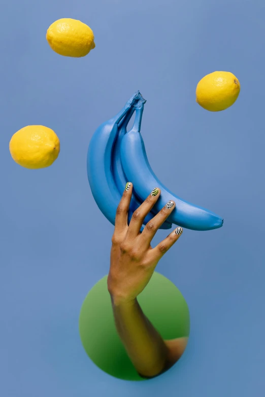 a person holding a bunch of bananas in front of a bunch of lemons, trending on unsplash, magic realism, vibrant blue, hands in air, artforum aesthetic, cool offset colors