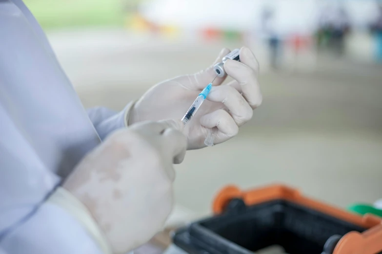 a person in white gloves holding a syet, holding syringe, 15081959 21121991 01012000 4k, instagram post, bioremediation