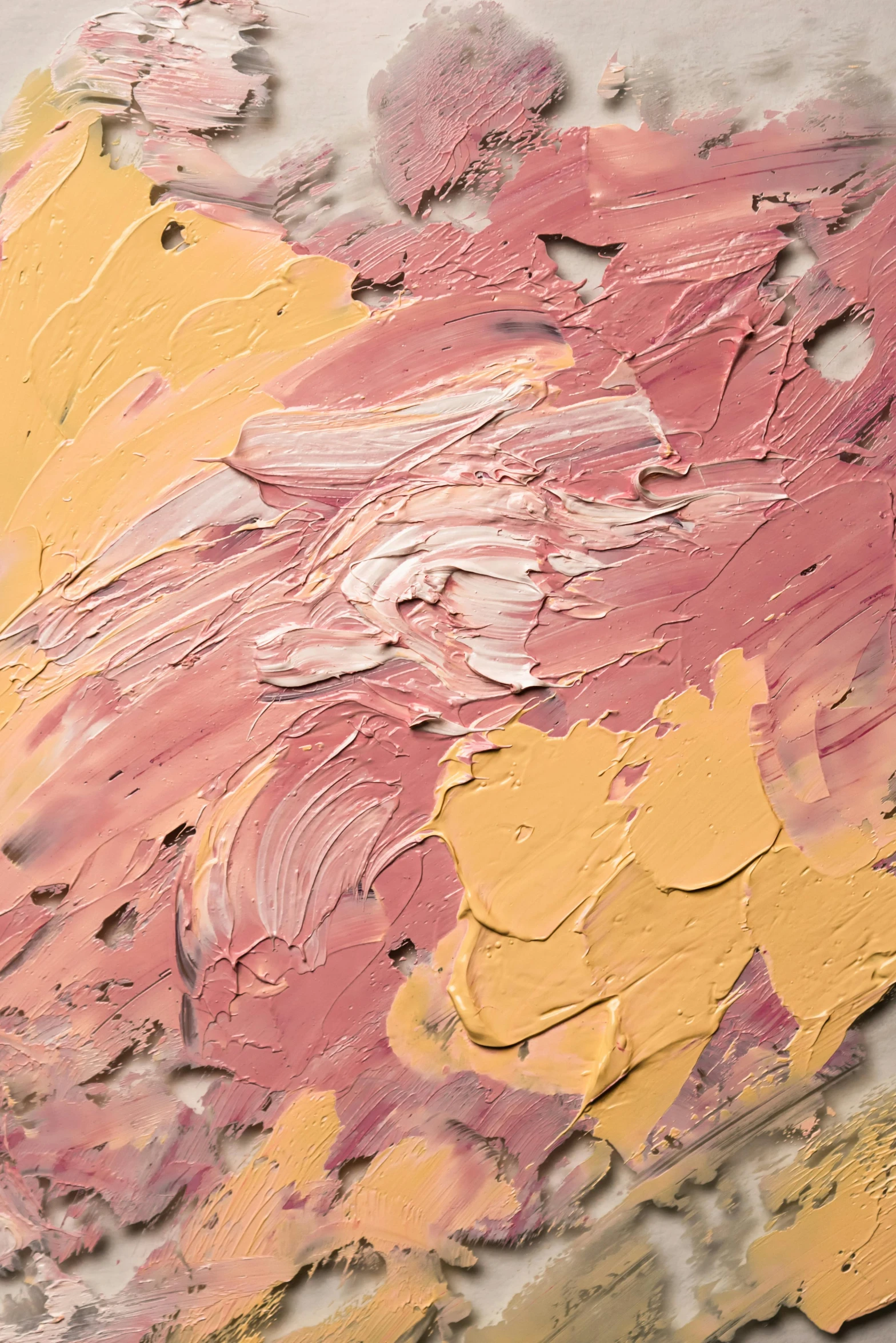 a close up of a painting on a table, inspired by Willem de Kooning, trending on pexels, pink and yellow, clay texture, petals, textured skin