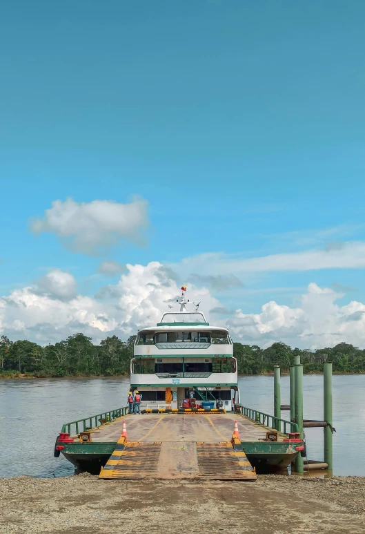a large boat sitting on top of a body of water, hurufiyya, amazon rainforest background, from the side, skies, facing away