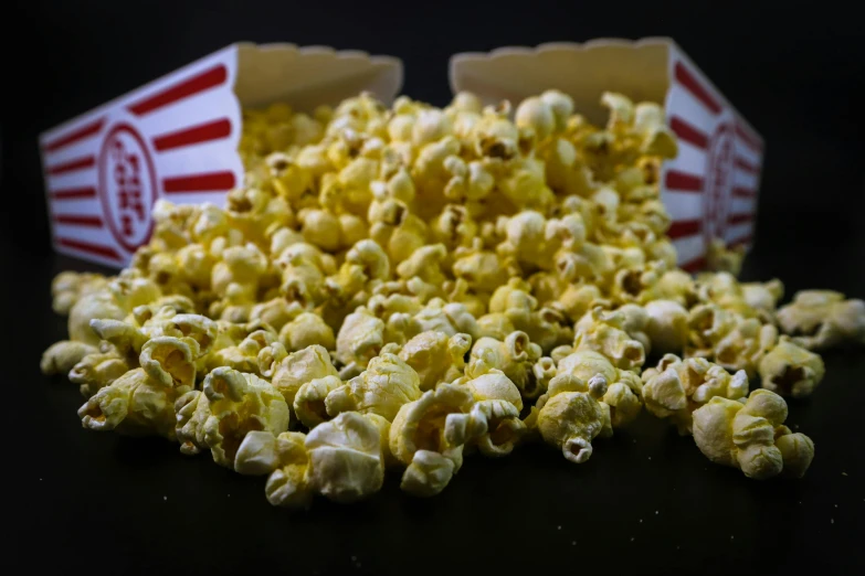 a pile of popcorn sitting on top of a table