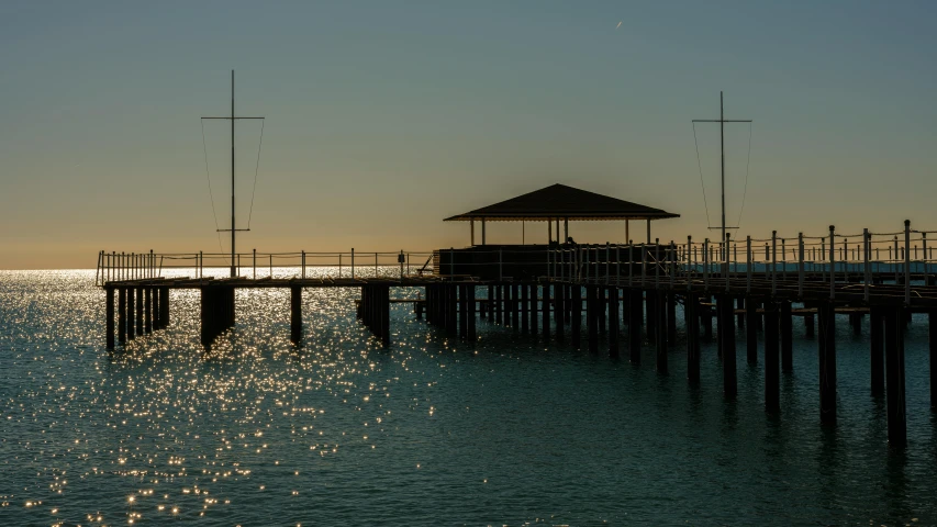 a pier in the middle of a body of water, pexels contest winner, australian tonalism, warm sunlight shining in, port, thumbnail, day setting