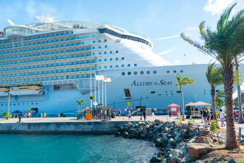 a large cruise ship docked at a dock, by Julia Pishtar, square, azure sky, tourist photo, multiple stories