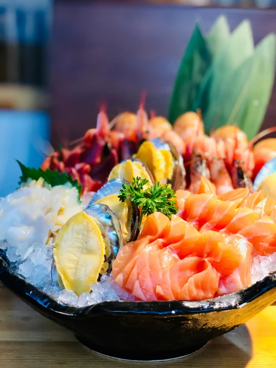 a close up of a bowl of food on a table, fish lense