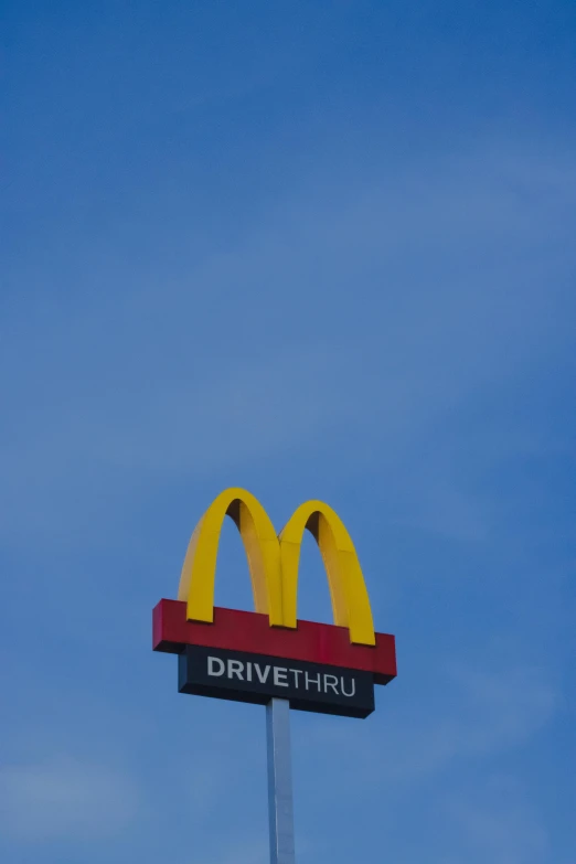 a mcdonald's drive thru sign against a blue sky, a portrait, unsplash, new zealand, square, high quality photo, in 2 0 1 2
