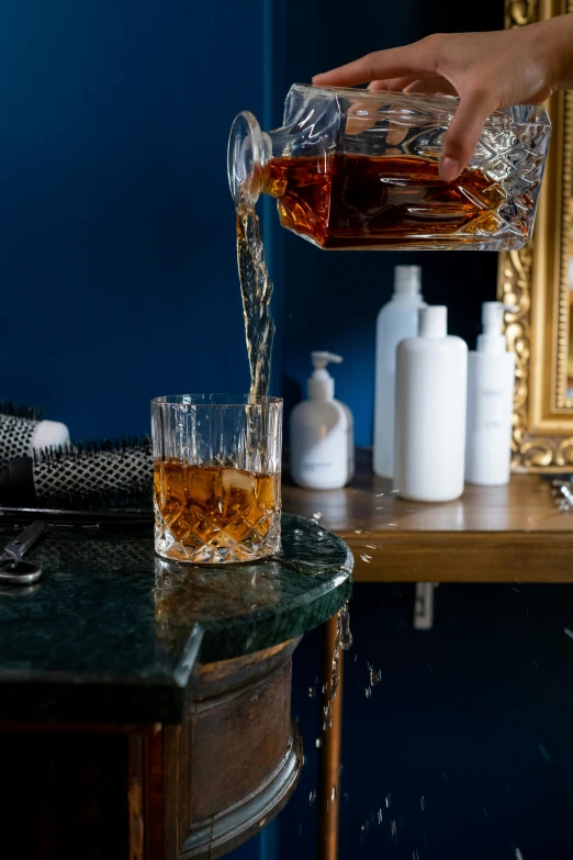 a person pouring a drink into a glass, inspired by William Grant Stevenson, renaissance, hair detailing, bath, product display photograph, detail shot