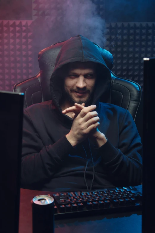 a man in a hoodie sitting in front of a computer, sat in his throne, smirking, dark backround, server in the middle