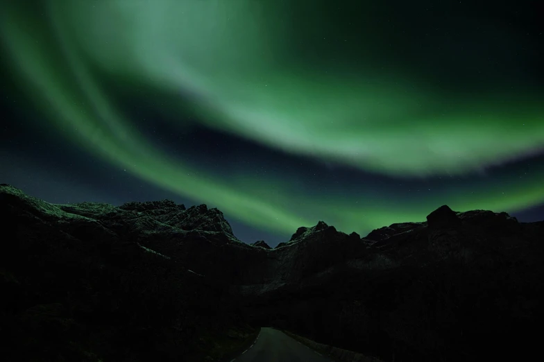 the aurora lights in the sky above a mountain range, by Sigrid Hjertén, pexels contest winner, hurufiyya, dark green, grey, panels, autumn season