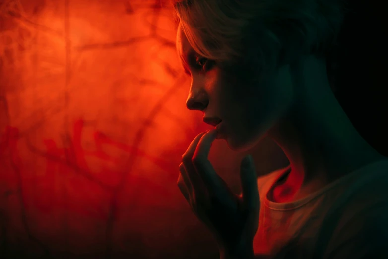 a woman standing in front of a red light, inspired by Elsa Bleda, digital art, devil may cry, pensive, instagram post, ciri
