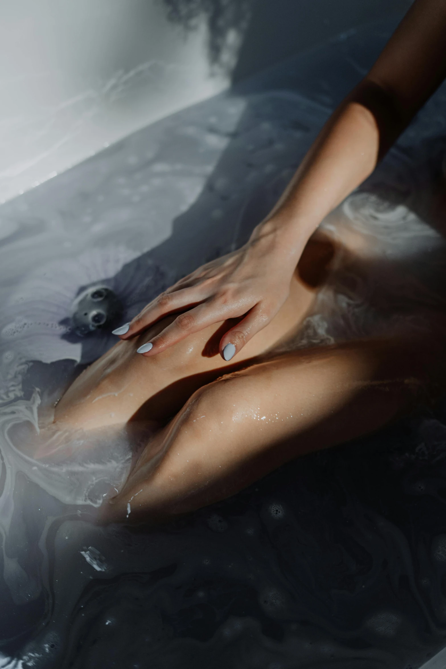 a woman taking a bath in a bathtub, inspired by Elsa Bleda, trending on pexels, process art, holding hands, mystic hue, silicone skin, ilustration