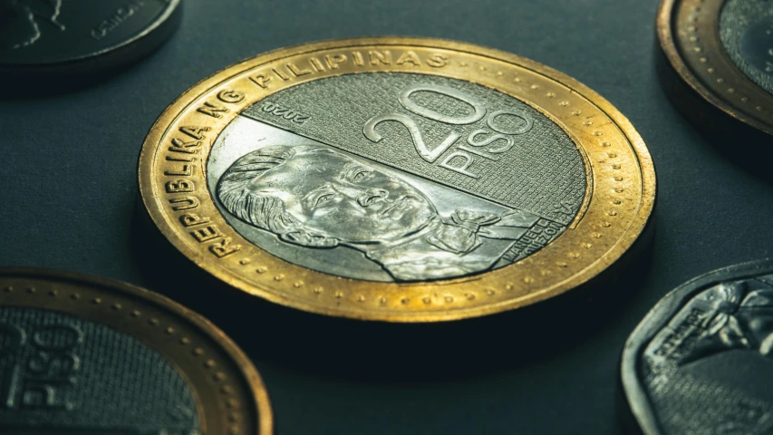 a close up of a coin on a table, a digital rendering, by Pablo Carpio, pexels contest winner, dau-al-set, philippines, guilloche, made of money, highly detailed shot