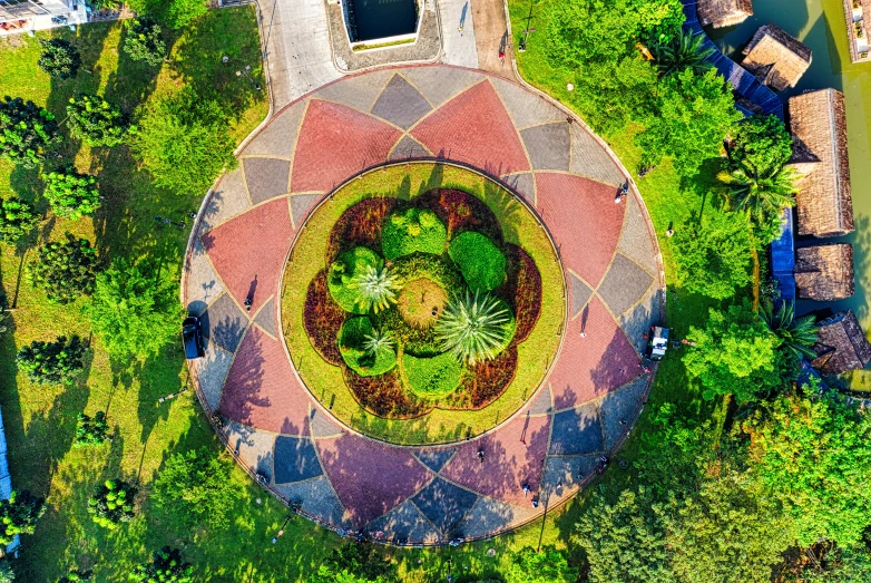a bird's eye view of a circular garden, a mosaic, pexels contest winner, sao paulo, post processed, monument, bromeliads