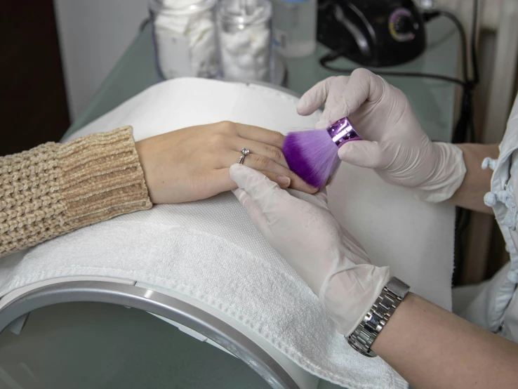 a woman getting her nails done at a nail salon, ultrarelistic, manly, thumbnail, purple