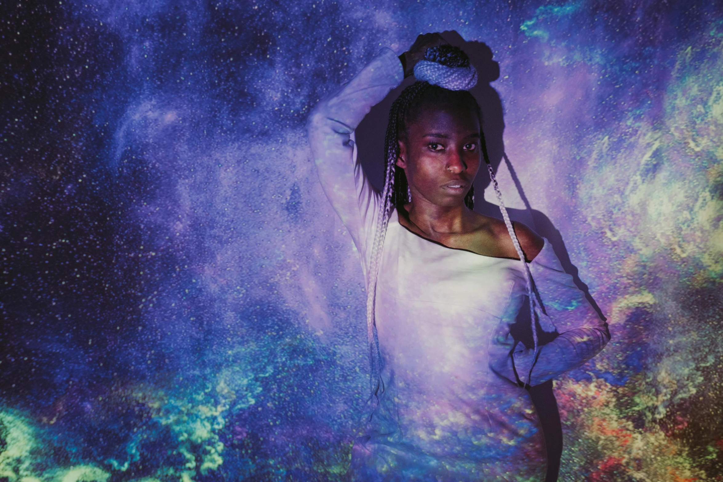 a woman with dreadlocks on top of her head, an album cover, pexels contest winner, afrofuturism, purple bioluminescence, ☁🌪🌙👩🏾, the galaxy, pose 1 of 1 6