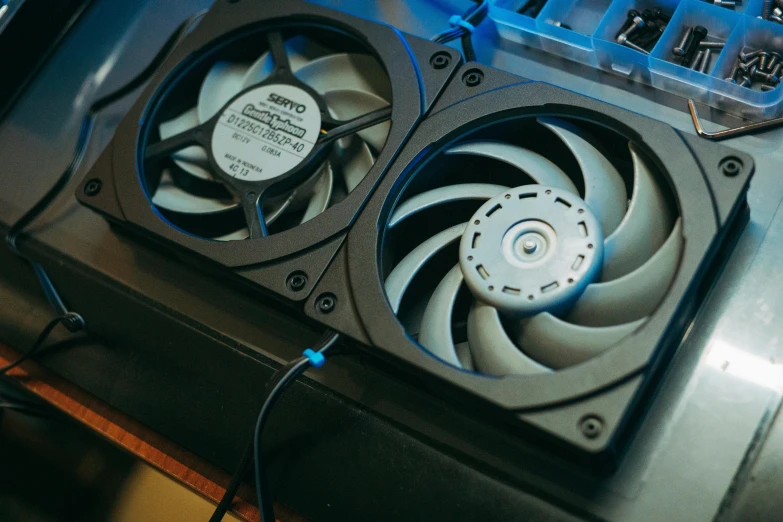 a close up of a computer case with a fan, a computer rendering, unsplash, best photo, fan favorite, nfts, maintenance