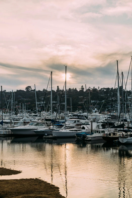 a harbor filled with lots of boats under a cloudy sky, pexels contest winner, soft morning light, manly, faded glow, today\'s featured photograph 4k