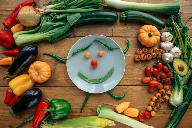 a smiley face made out of vegetables on a plate, 15081959 21121991 01012000 4k, background image, delightful surroundings, 🦩🪐🐞👩🏻🦳