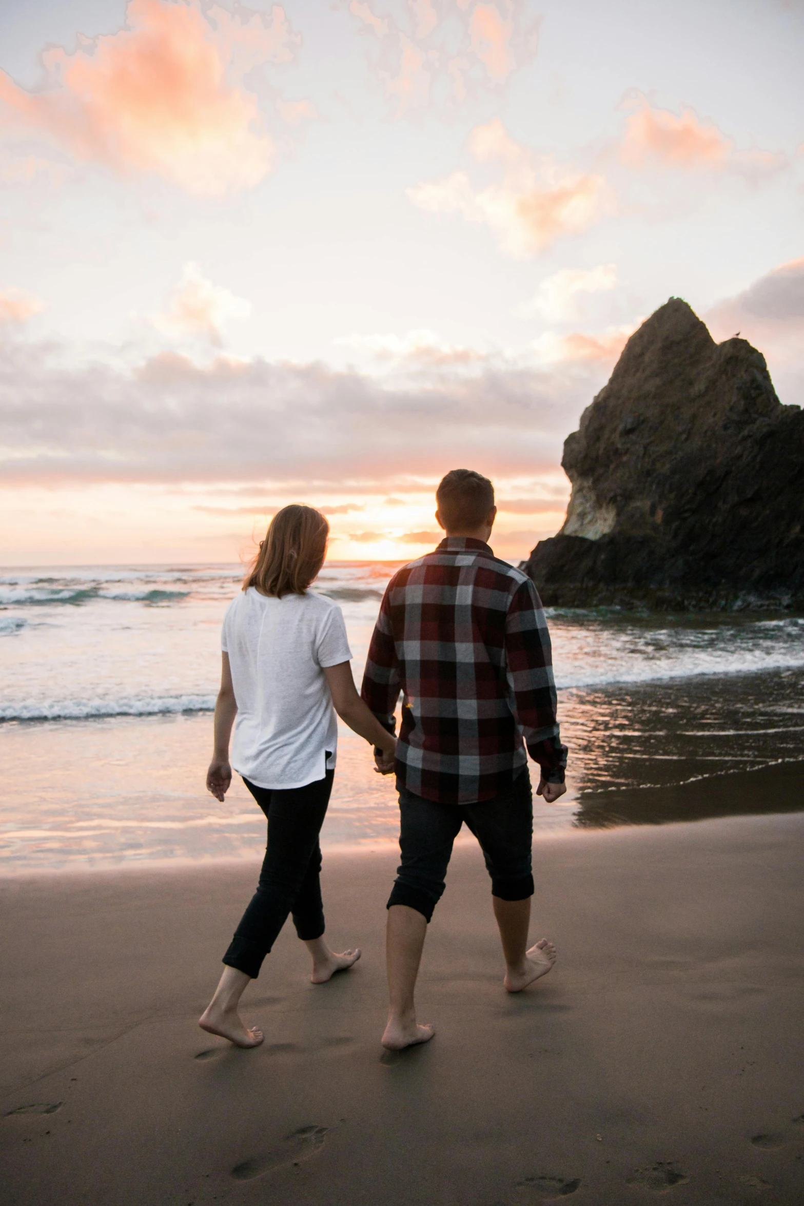 a man and a woman walking on a beach, by Jessie Algie, unsplash contest winner, abel tasman, blonde, morning glow, romance