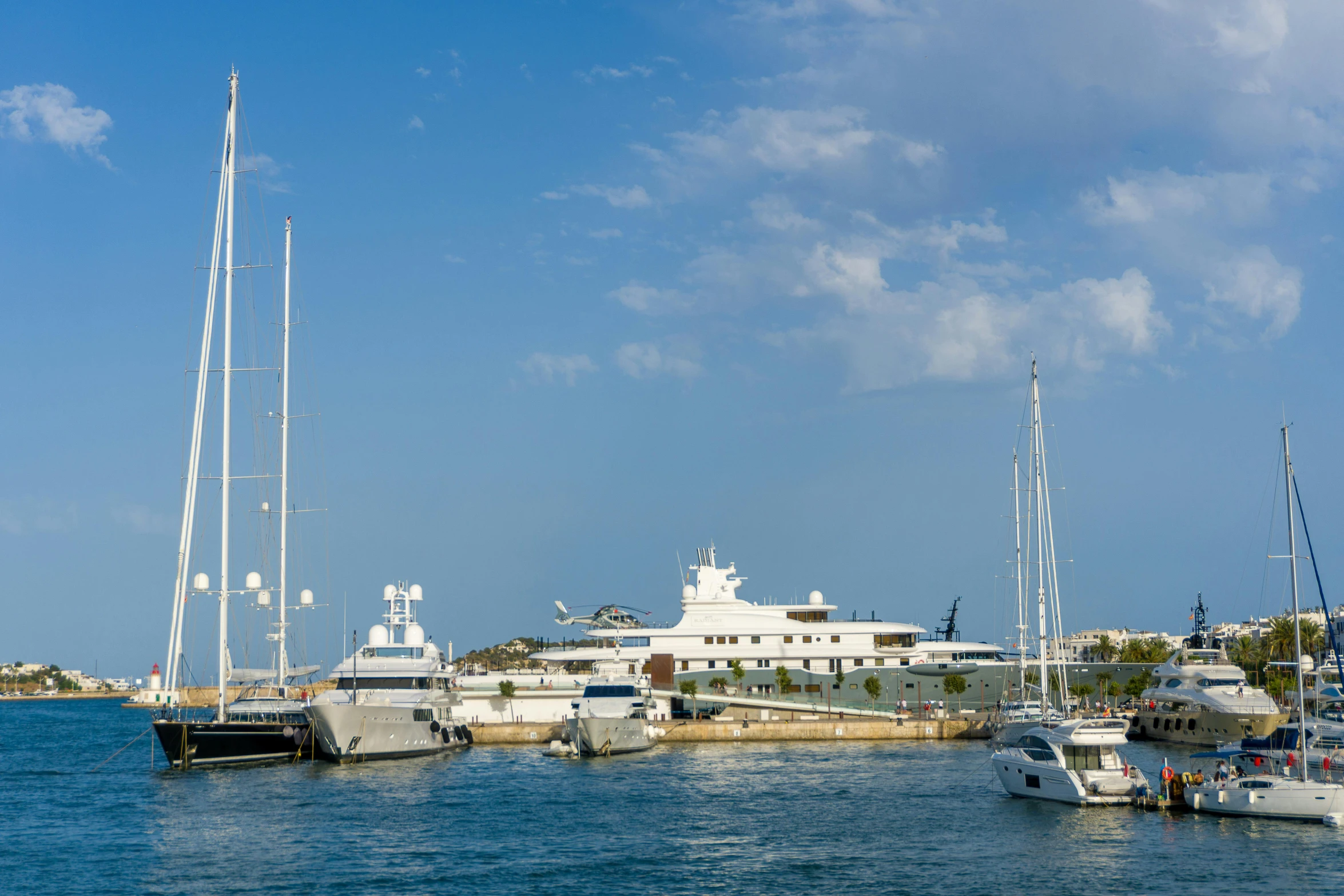 a number of boats in a body of water, by Carlo Martini, pexels contest winner, modernism, on a super yacht, port, cyprus, high quality picture