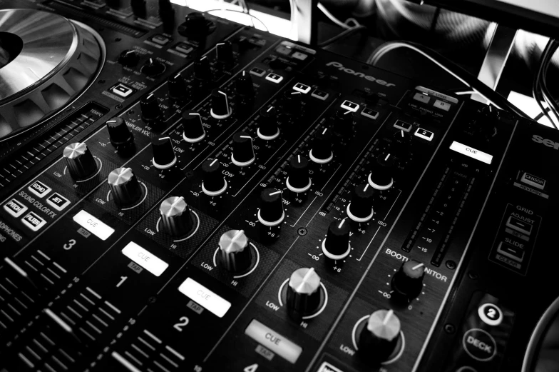 a black and white photo of a dj mixer, a black and white photo, by Byron Galvez, pexels, process art, panels, black and white color only, denoised, platforms