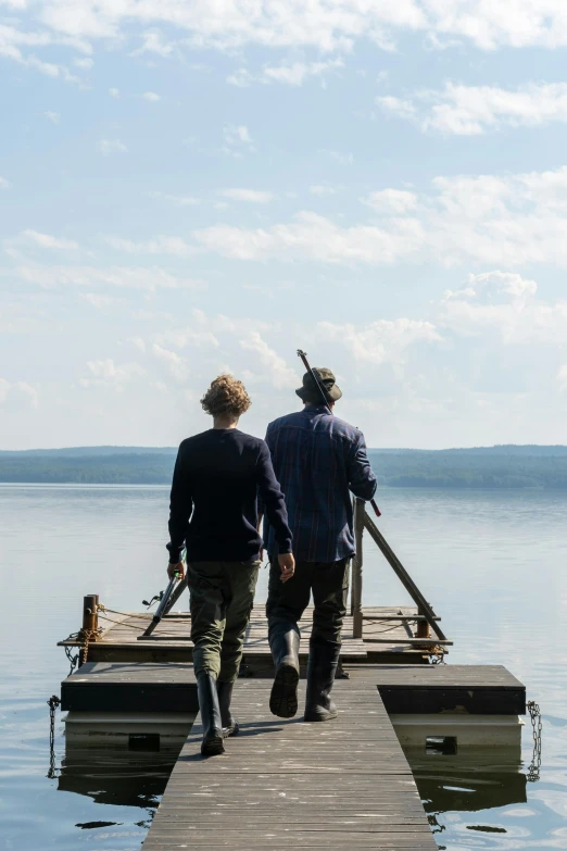 a couple of people that are standing on a dock, an album cover, by Simon Marmion, trending on unsplash, romanticism, two male, quebec, from the tusk movie, looking off into the distance