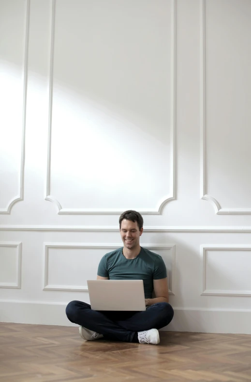 a man sitting on the floor using a laptop, slightly minimal, david lazar, tinder profile, classical